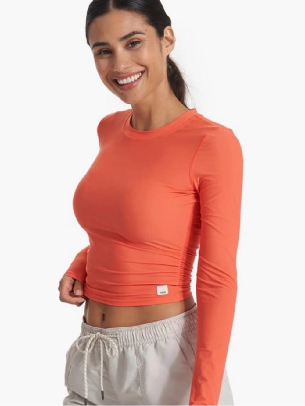 Vuori Women’s Long Sleeve SWIM Top in Coral Orange